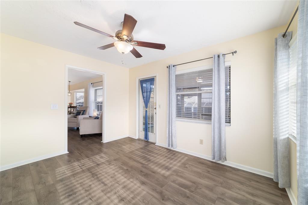 4385 North Bacall Loop Beverly Hills, FL 34465 - Photo 46 of 60 a view of a livingroom with a ceiling fan and window
