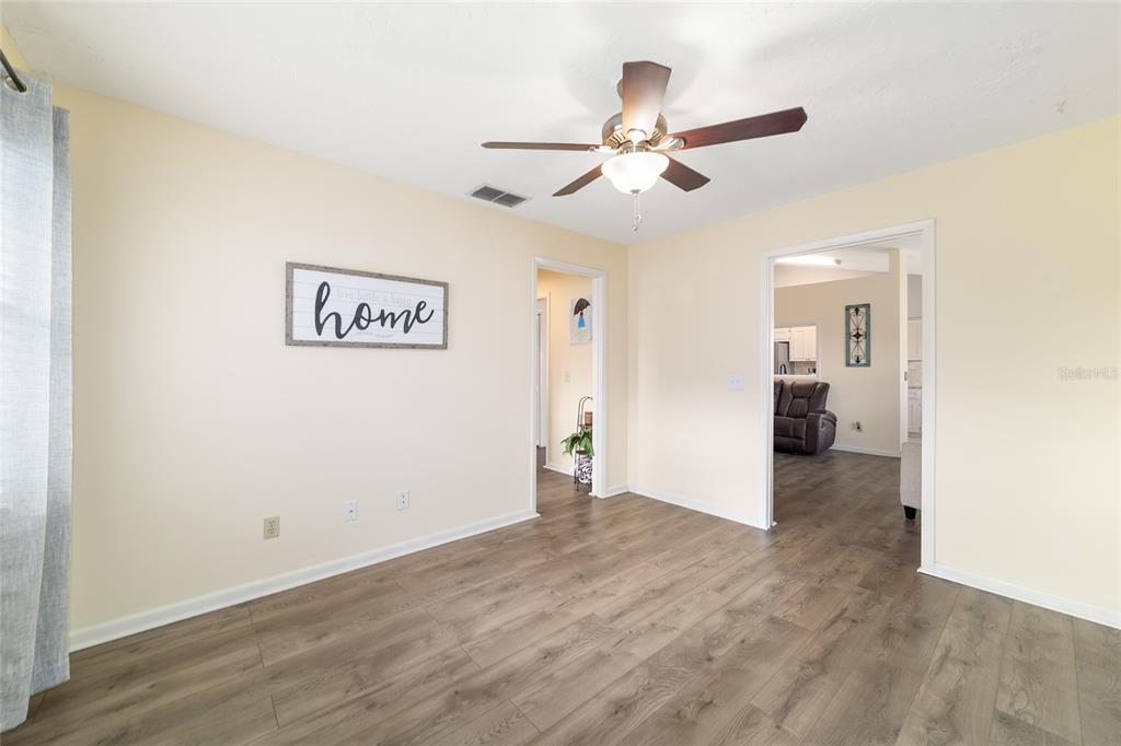 4385 North Bacall Loop Beverly Hills, FL 34465 - Photo 47 of 60 a view of a hallway with wooden floor and closet