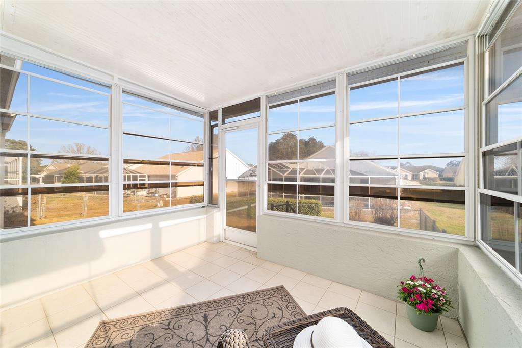4385 North Bacall Loop Beverly Hills, FL 34465 - Photo 50 of 60 a living room filled with furniture and a large window