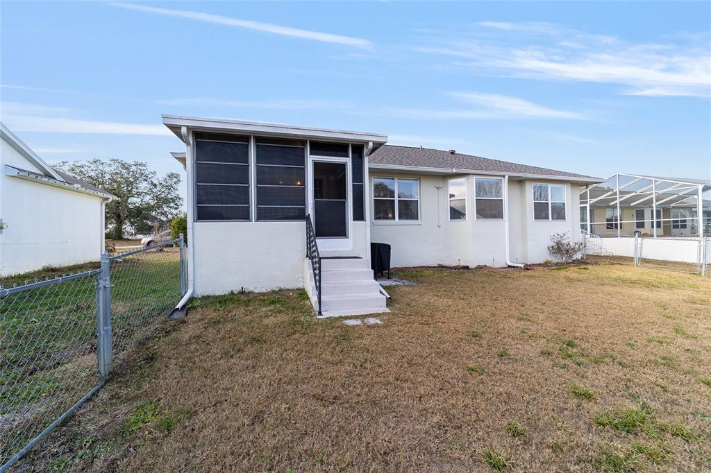4385 North Bacall Loop Beverly Hills, FL 34465 - Photo 52 of 60 front view of a house with a yard