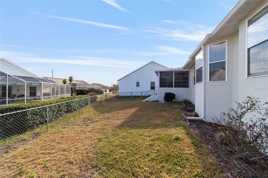 4385 North Bacall Loop Beverly Hills, FL 34465 - Photo 54 of 60 a view of a house with backyard and sitting area