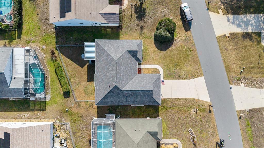 4385 North Bacall Loop Beverly Hills, FL 34465 - Photo 57 of 60 an aerial view of residential houses with outdoor space
