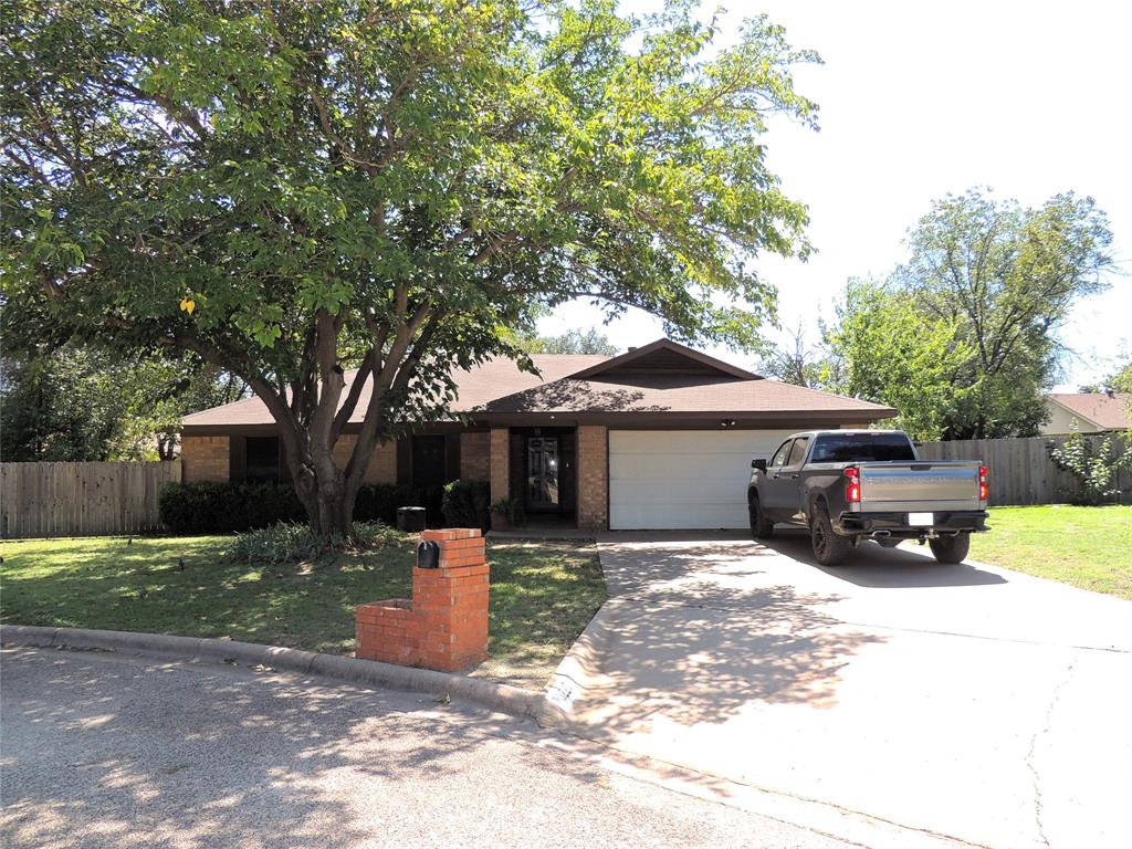 3225 Falcon Drive Abilene, TX 79606 - Photo 1 of 1 a view of a house with a yard and large tree