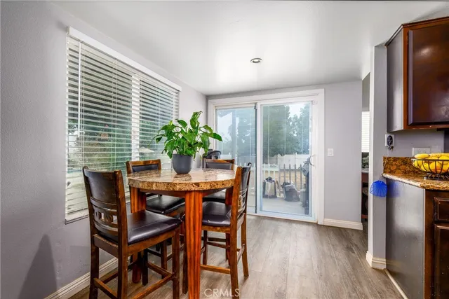 a bed room with a bed and a mirror