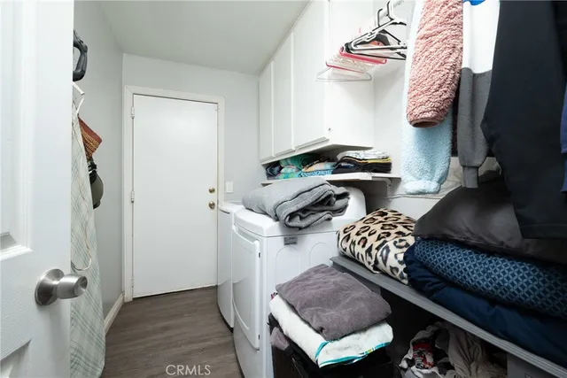 a bedroom with a bed and dresser