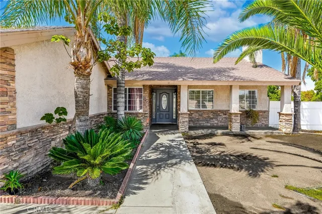 a swimming pool with outdoor seating