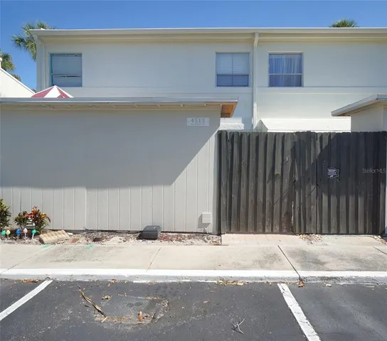 a view of a backyard of a house