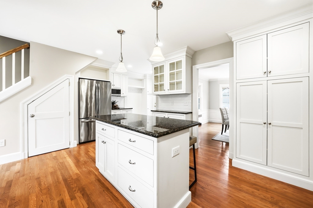 28 Homer Road Belmont, MA 02478 - Photo 17 of 41 a kitchen with stainless steel appliances granite countertop a refrigerator a sink and a stove