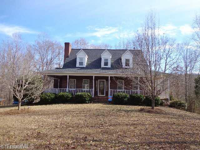 2341 South Fork Road Denton, NC 27239 - Photo 1 of 16 Exterior Front. Brick Home w/Wrap Around Front Porch. Landscaping, Fencing & Cross Fencing. Covered Wood Shed.