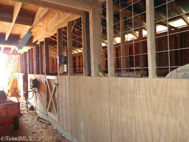 2341 South Fork Road Denton, NC 27239 - Photo 13 of 16 Stable/Barn. Inside 5 Stall Barn