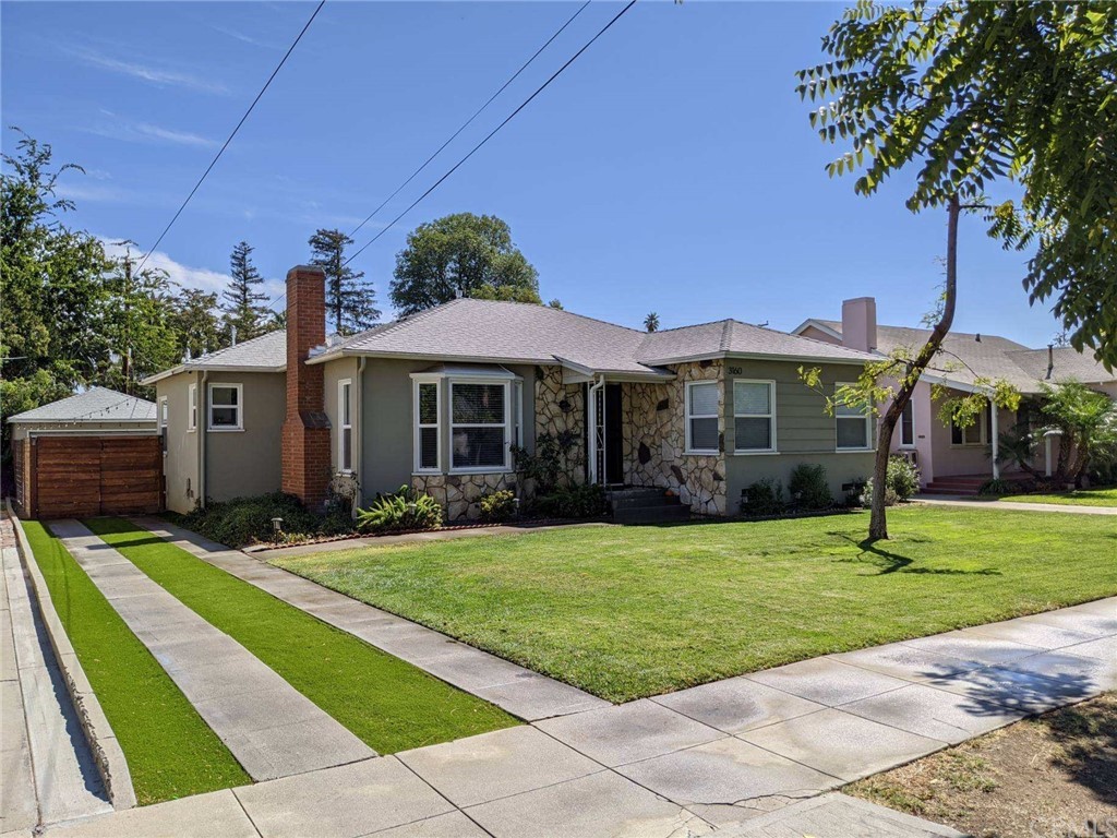 3160 Locust Street Riverside, CA 92501 - Photo 1 of 1 a front view of a house with a yard