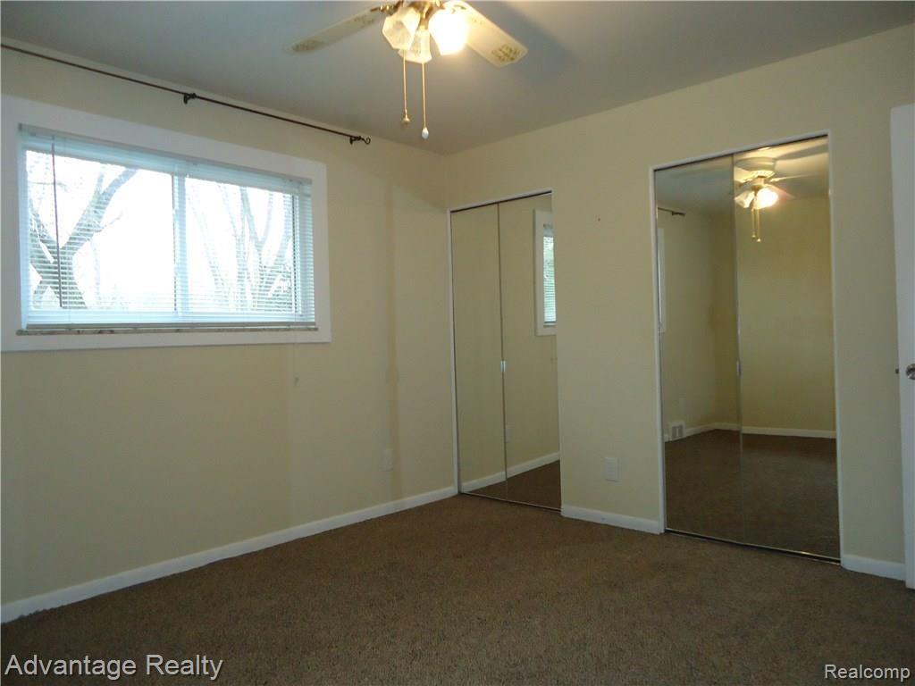 49437 Callens Road New Baltimore, MI 48047 - Photo 19 of 28 his & her closet in bedroom
