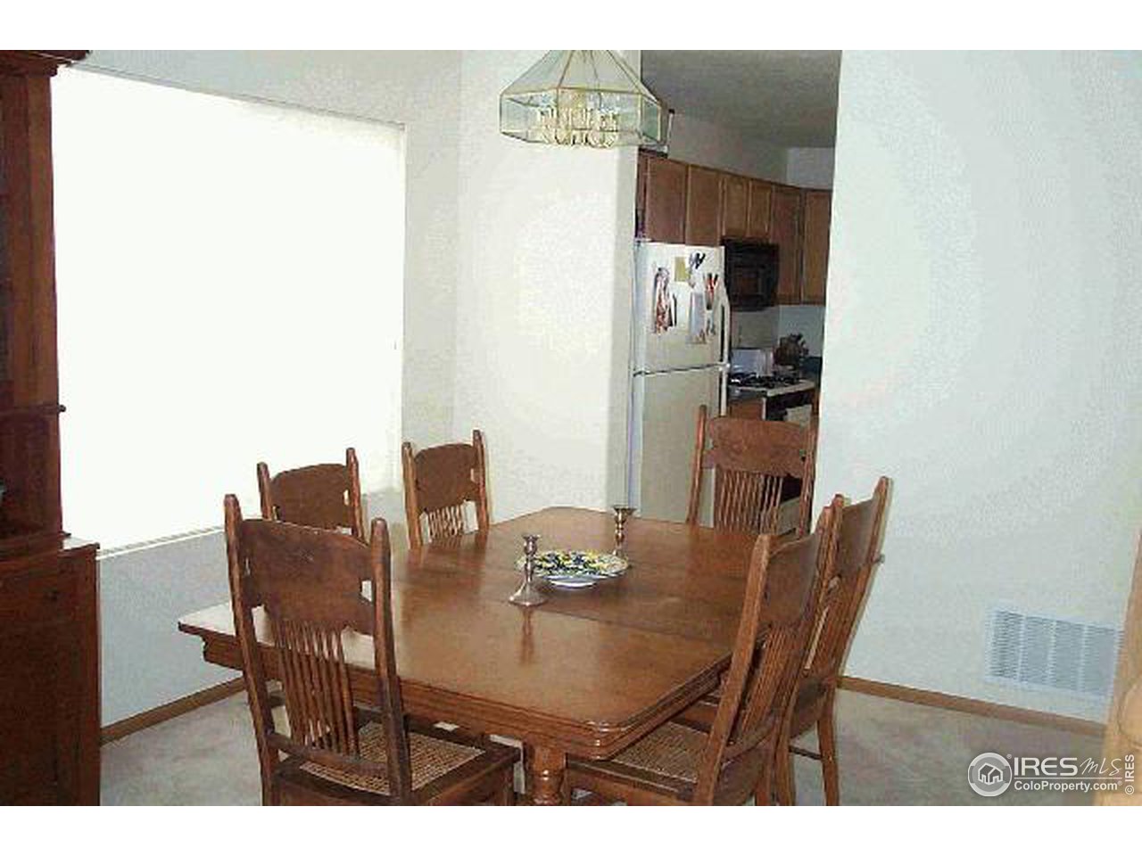 1269 Trail Ridge Road Longmont, CO 80504 - Photo 3 of 7 a view of a dining room with furniture