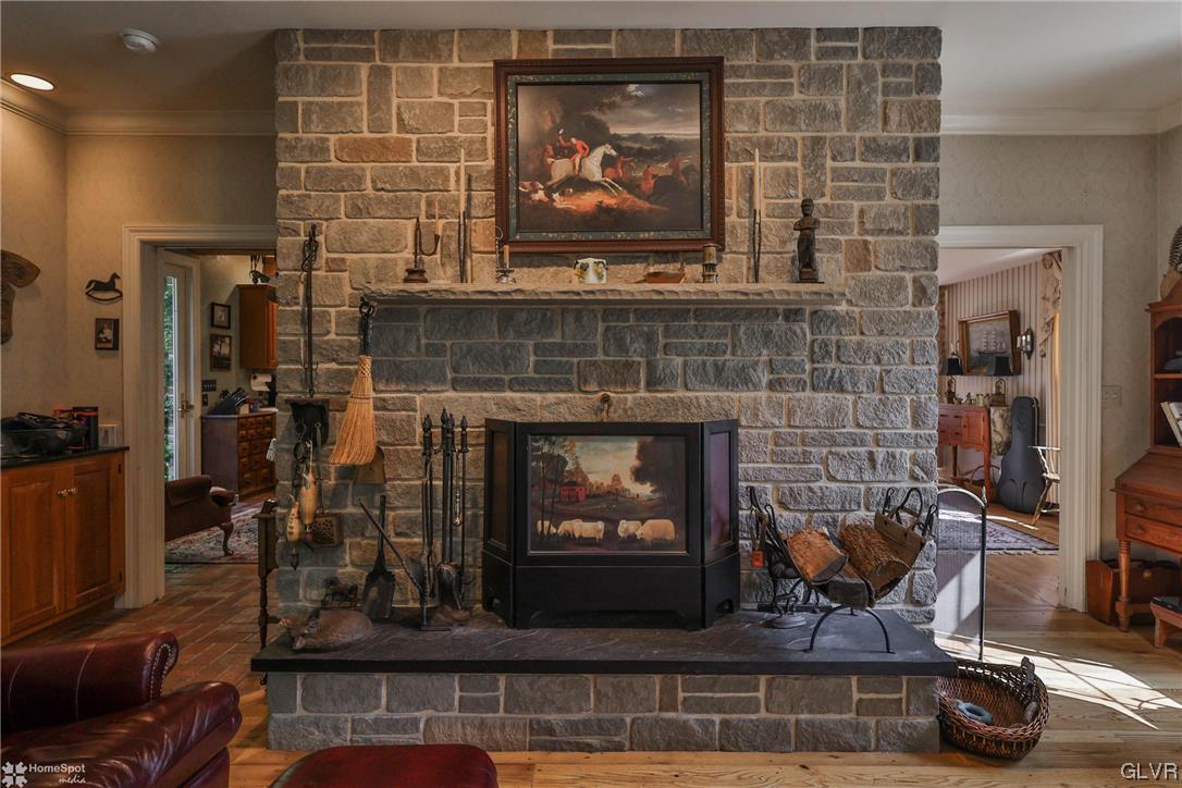 182 Baron Road Wind Gap, PA 18091 - Photo 12 of 49 a fireplace with wooden frame