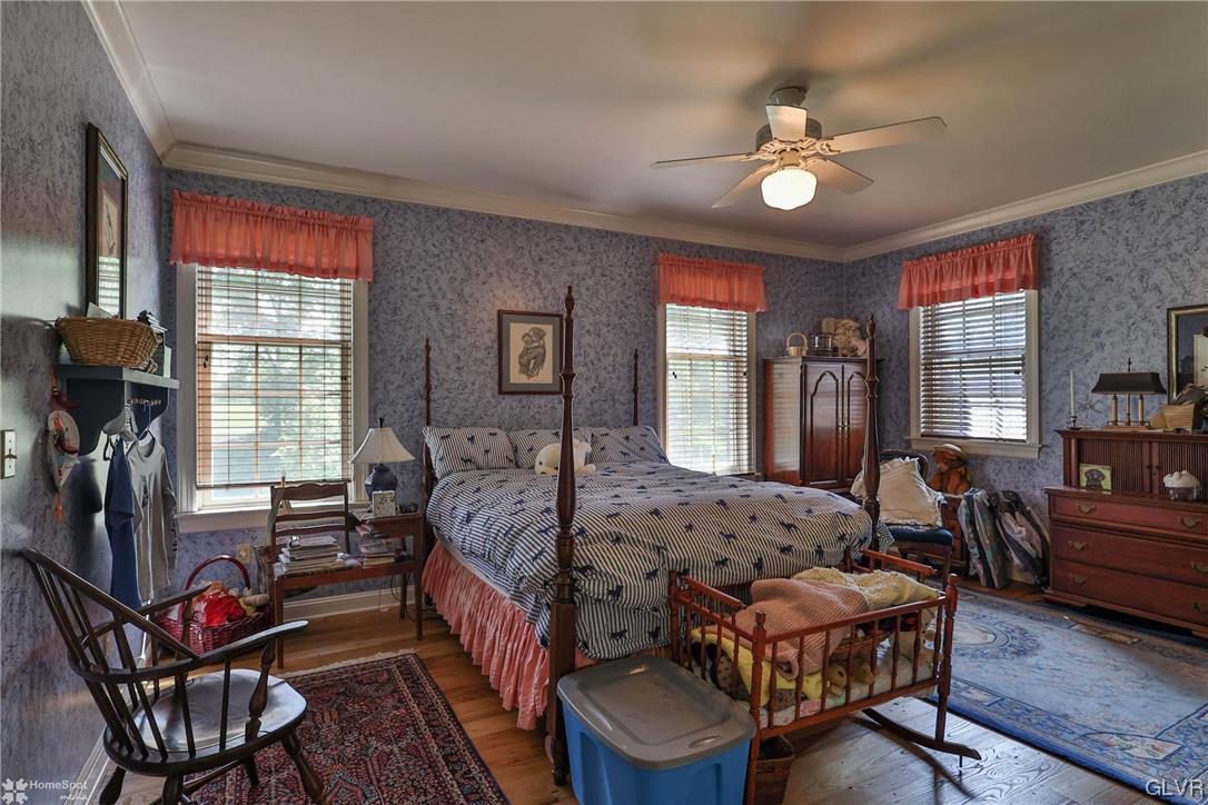 182 Baron Road Wind Gap, PA 18091 - Photo 24 of 49 a bedroom with furniture and a chandelier