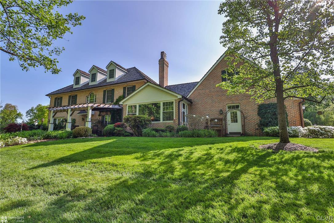 182 Baron Road Wind Gap, PA 18091 - Photo 32 of 49 a front view of a house with a yard and trees