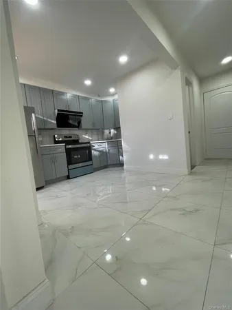 a bathroom with a sink toilet and vanity