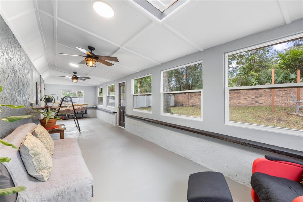 1005 Mook Street Brandon, FL 33510 - Photo 32 of 48 a living room with furniture and a large window
