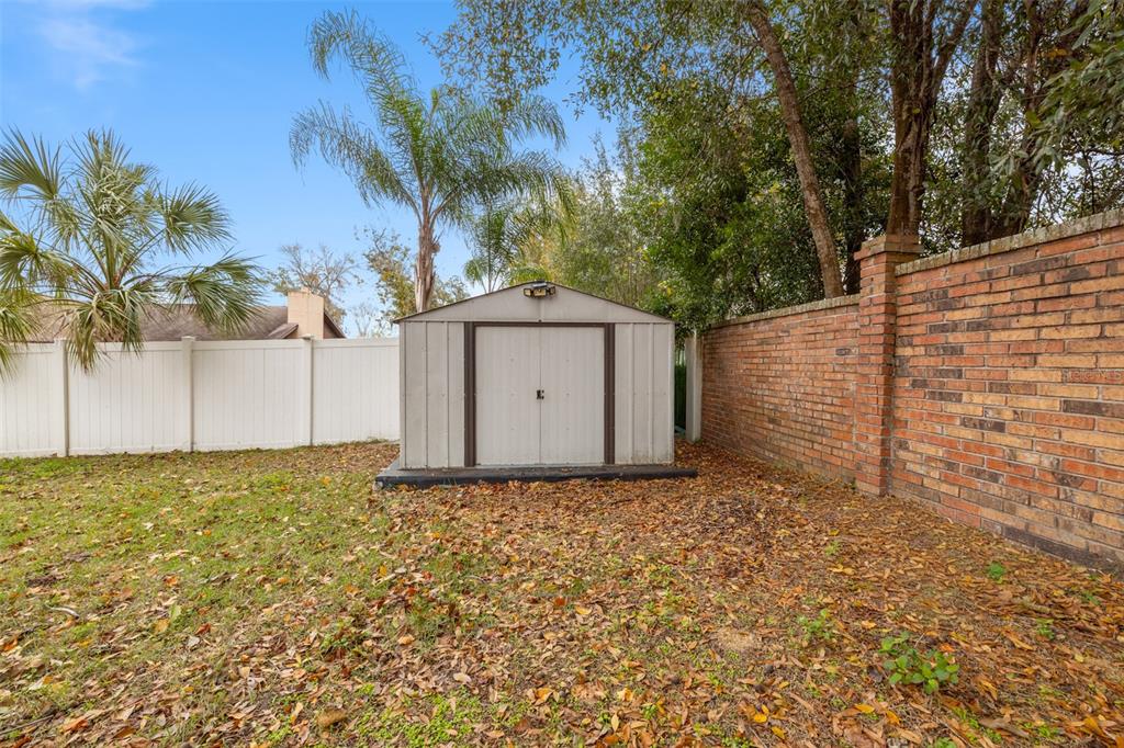 1005 Mook Street Brandon, FL 33510 - Photo 34 of 48 a view of a house with a garden