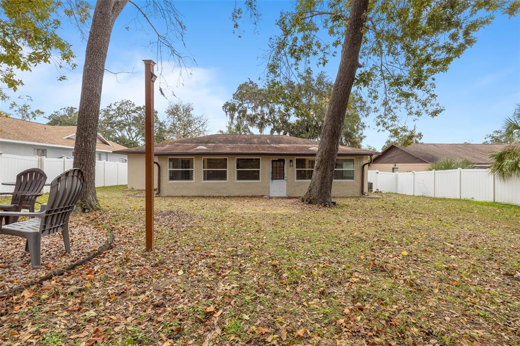 1005 Mook Street Brandon, FL 33510 - Photo 35 of 48 a house view with a garden space