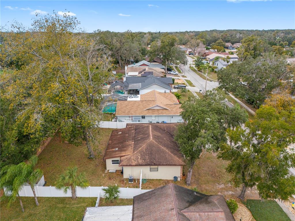 1005 Mook Street Brandon, FL 33510 - Photo 41 of 48 an aerial view of residential houses with outdoor space and trees