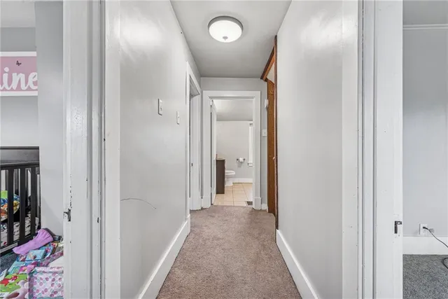 a view of a hallway with a closet