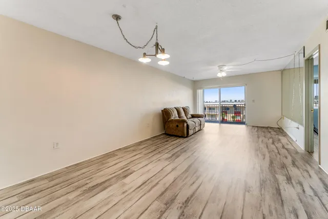 a view of a storage & utility room with wooden floor
