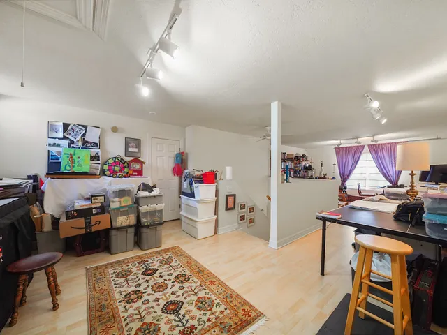 a living room with furniture and a table