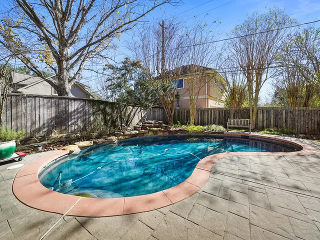 a view of a house with swimming pool