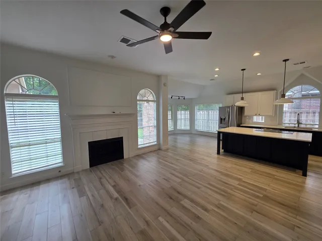 a view of a kitchen with microwave and stove