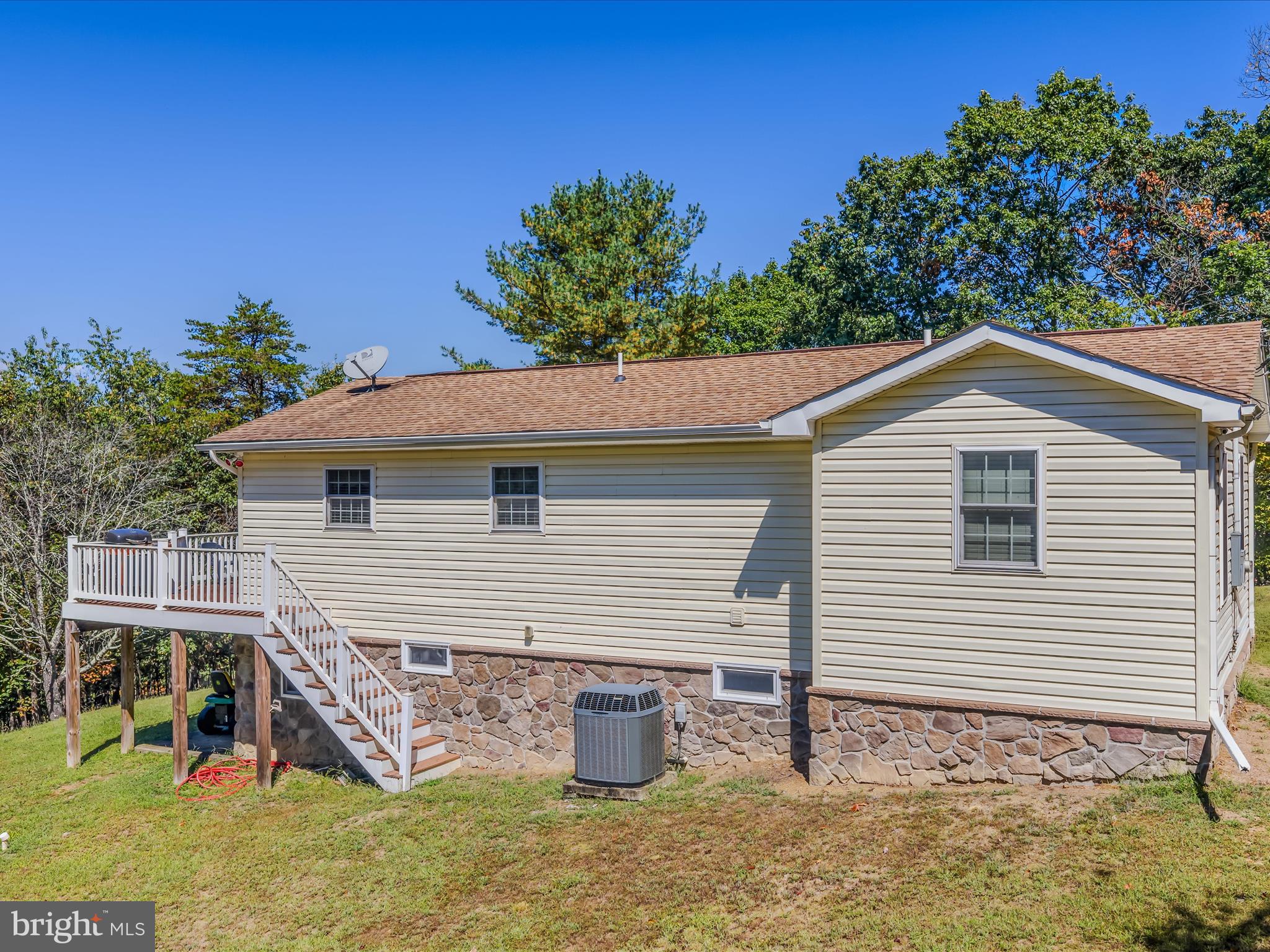 608 DeHaven Road Berkeley Springs, WV 25411 - Photo 34 of 52 a front view of a house with porch
