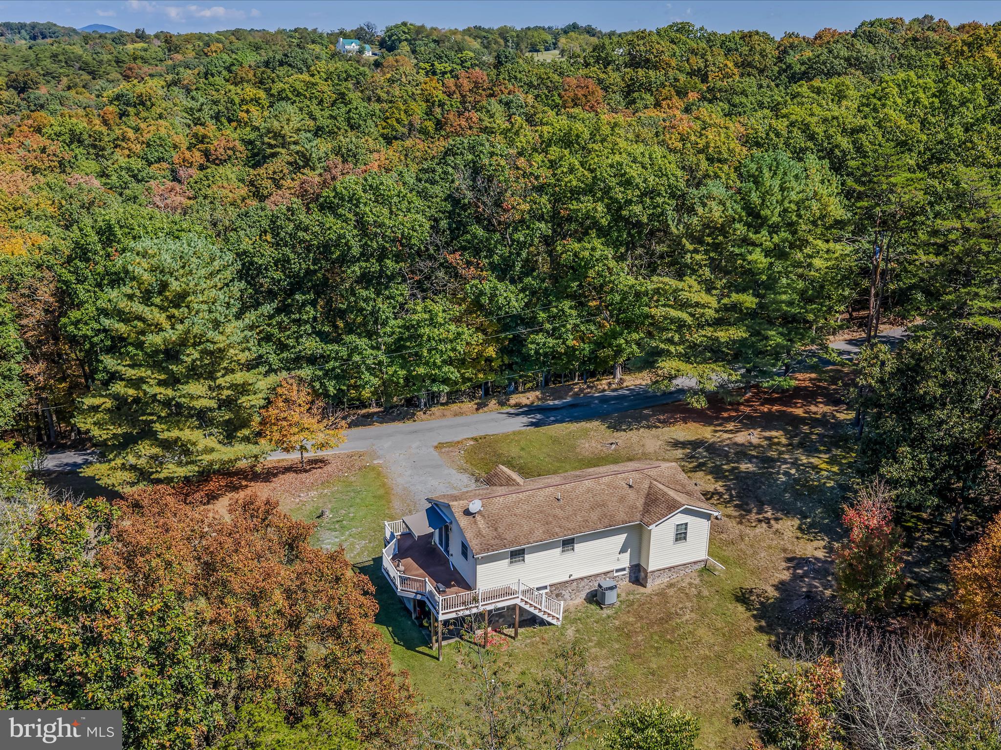 608 DeHaven Road Berkeley Springs, WV 25411 - Photo 35 of 52 a view of a swimming pool with a yard