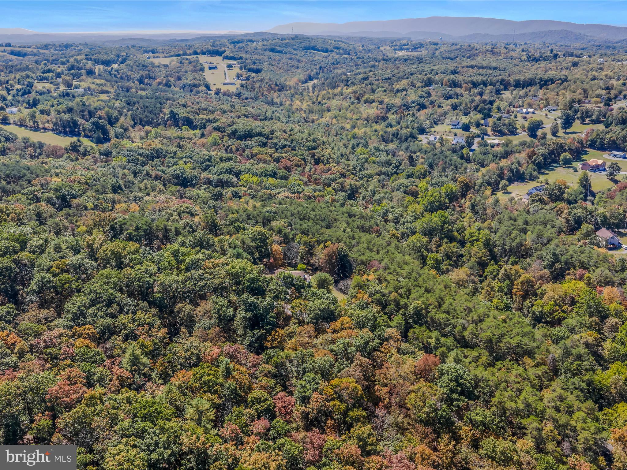 608 DeHaven Road Berkeley Springs, WV 25411 - Photo 51 of 52 an aerial view of residential houses with outdoor space and trees