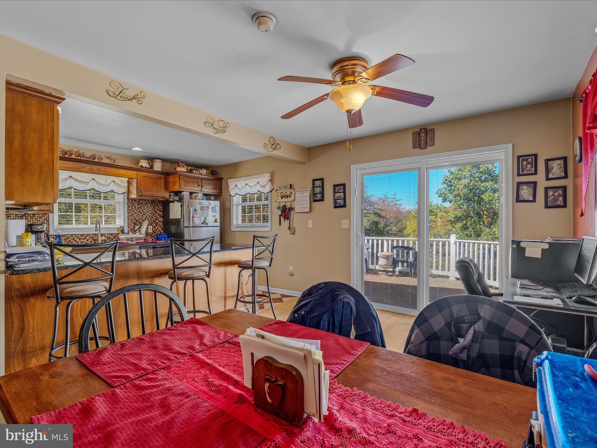 608 DeHaven Road Berkeley Springs, WV 25411 - Photo 8 of 52 a bedroom with furniture and large windows