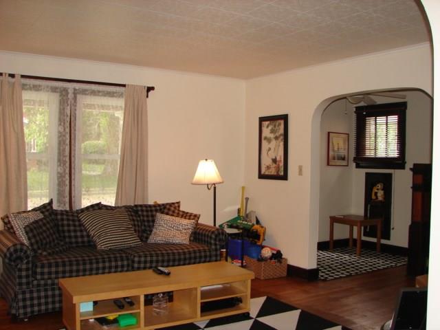 897 Malvern Road Pittsburgh, PA 15202 - Photo 14 of 25 The formal living room is ample, sits adjacent to the main entry, and offers a large picture window to the front sitting porch
