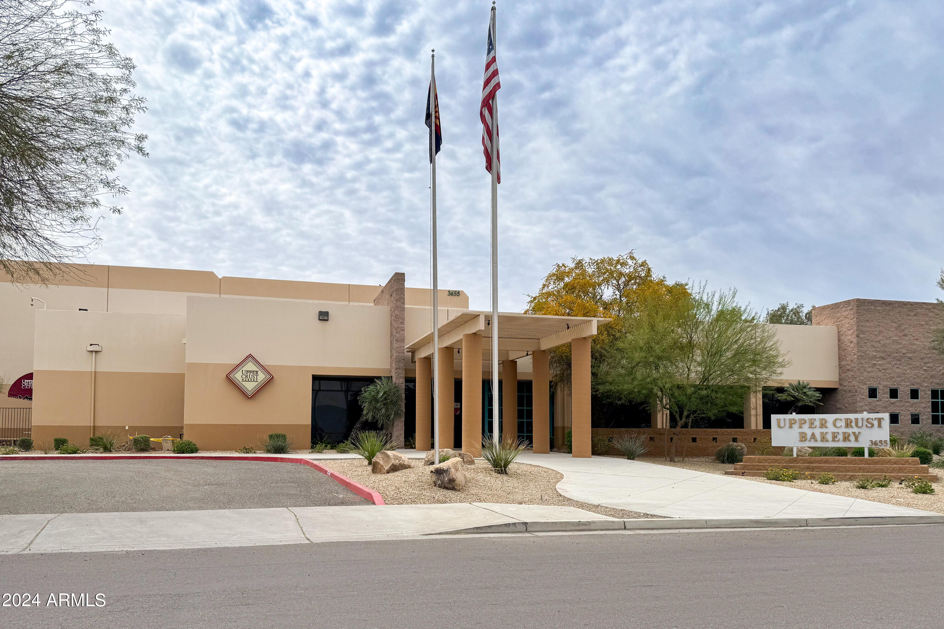 3601 West Melvin Street, Unit 7 Phoenix, AZ 85009 - Photo 15 of 26 a front view of a building with residential houses