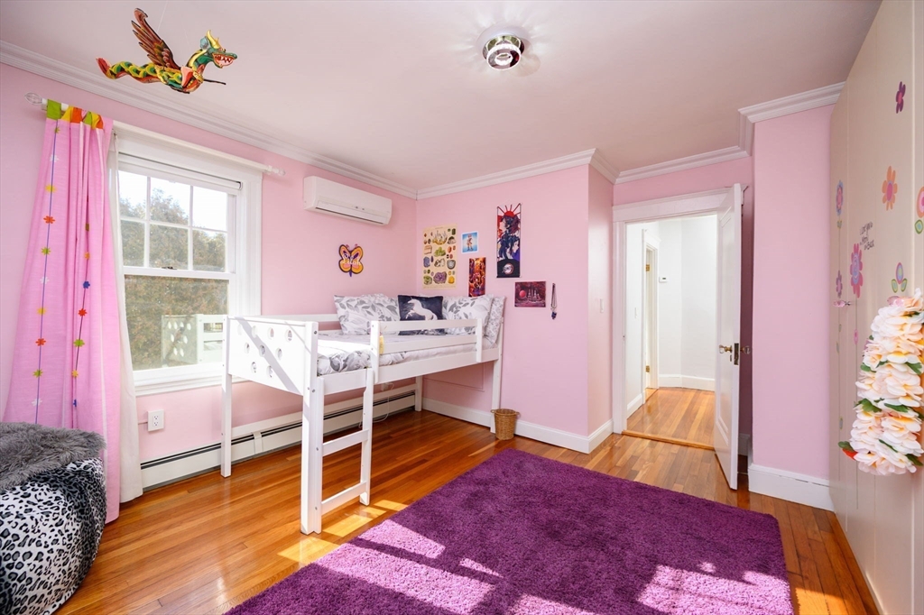 1099 Brook Road Milton, MA 02186 - Photo 26 of 41 a view of a livingroom with furniture and a window