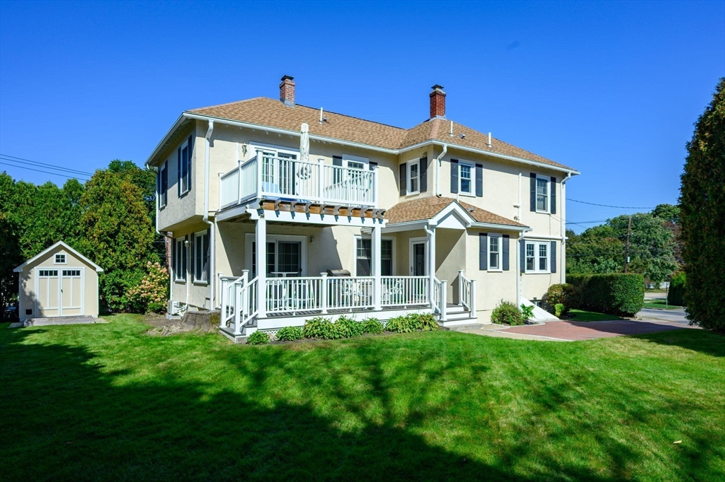 1099 Brook Road Milton, MA 02186 - Photo 31 of 41 a front view of a house with a yard