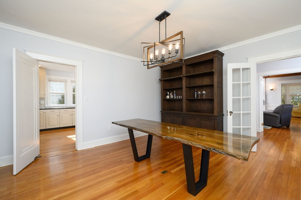 1099 Brook Road Milton, MA 02186 - Photo 8 of 41 a view of a livingroom with furniture and wooden floor