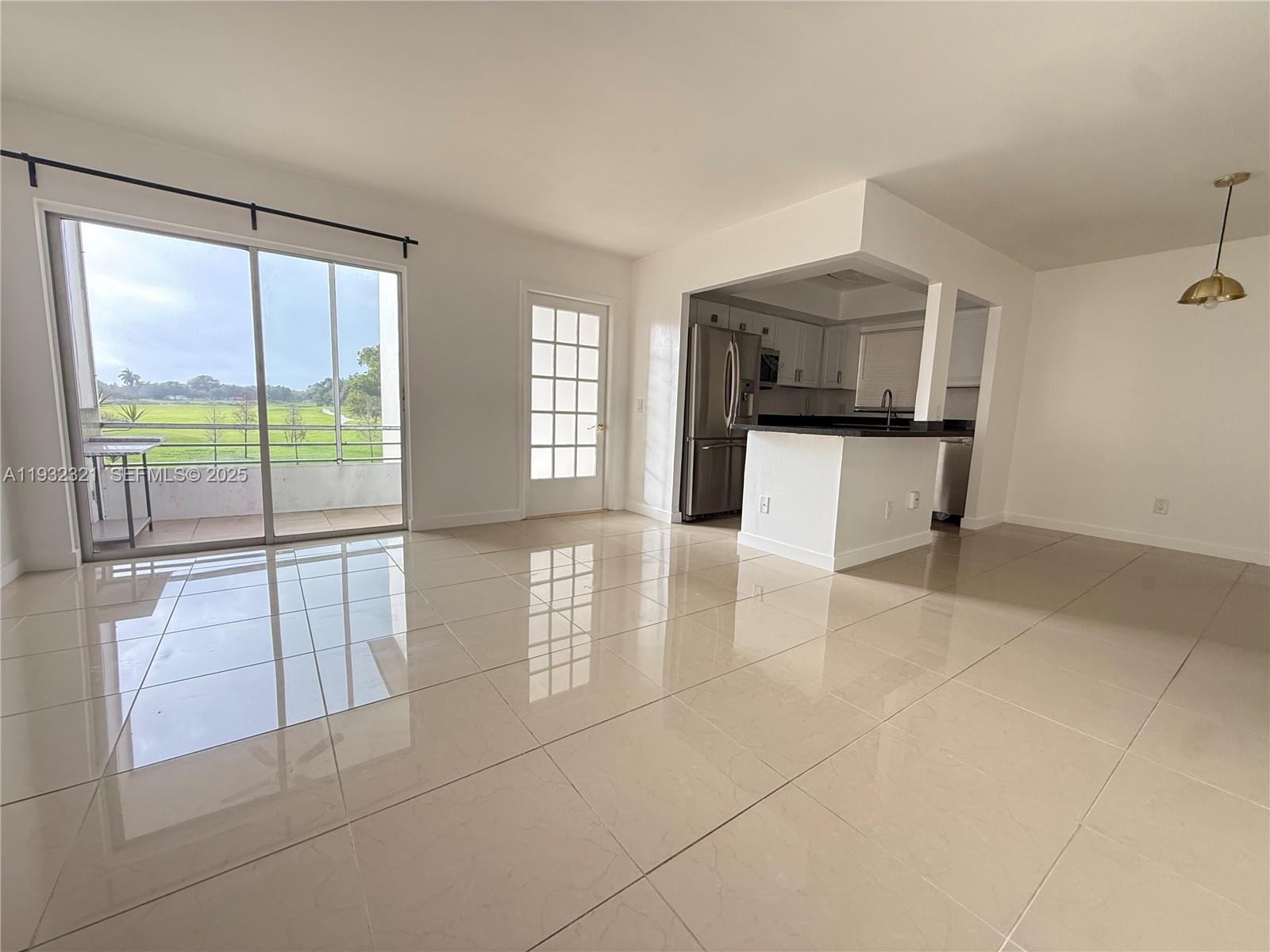 Arrowhead Condominium Davie, FL 33324 - Photo 26 of 35 a view of an empty room with a window