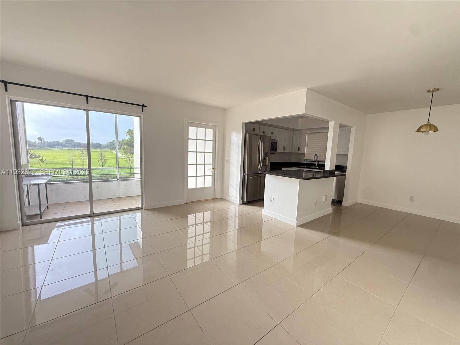 Arrowhead Condominium Davie, FL 33324 - Photo 27 of 35 a view of a livingroom with a flat screen tv