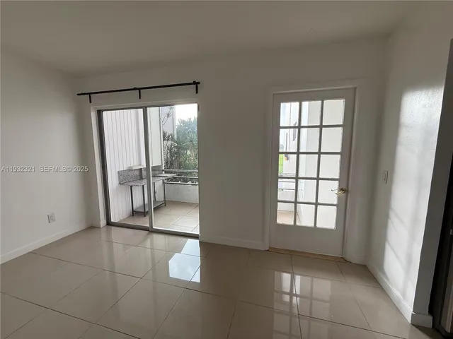a bathroom with a sink toilet and mirror