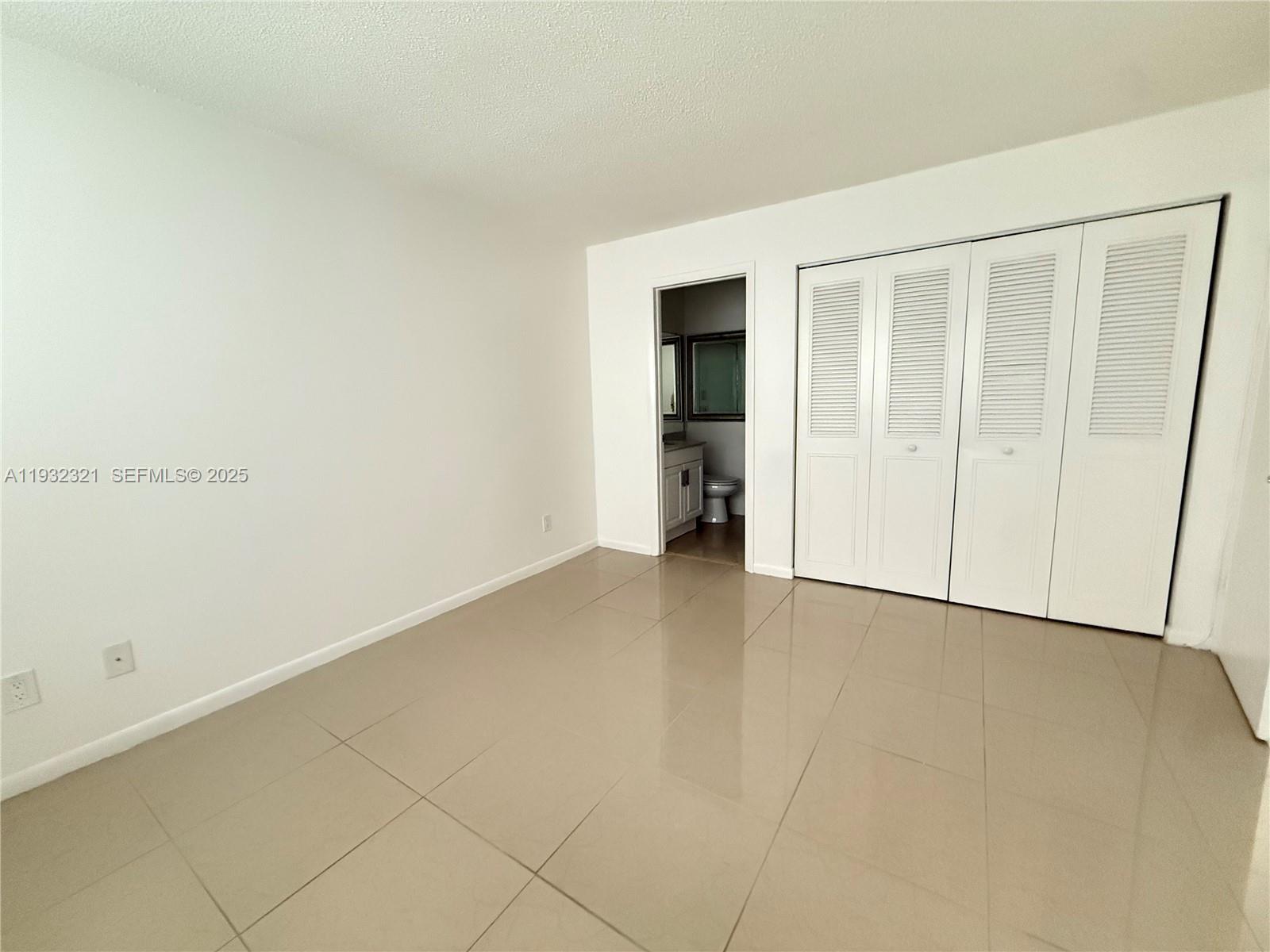 Arrowhead Condominium Davie, FL 33324 - Photo 10 of 35 wooden floor in an empty room