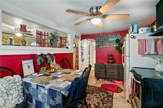 a view of a dining room with furniture