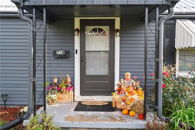 a front view of a house with a garage