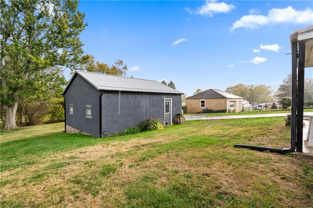 718 Gladden Road Canonsburg, PA 15317 - Photo 8 of 28 a house view with a garden space