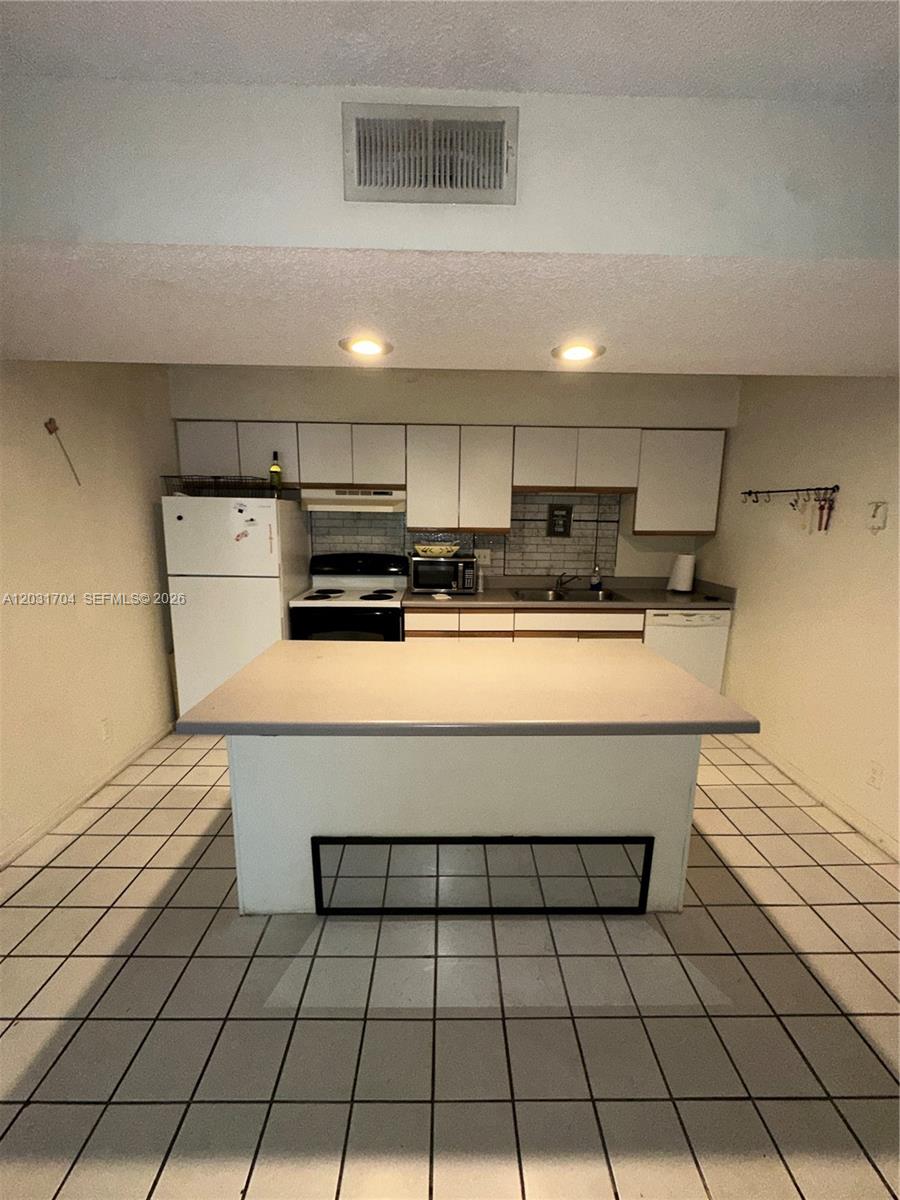 4055 West McNab Road, Unit H309 Pompano Beach, FL 33069 - Photo 1 of 16