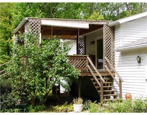 743 Unionville Road Prospect, PA 16052 - Photo 15 of 18 Patio/Deck. Deck leading to the above-ground pool.