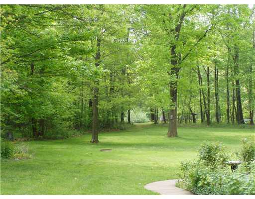 743 Unionville Road Prospect, PA 16052 - Photo 17 of 18 Yard/Garden. Level yard leading to wooded area where you can sit and see all the wildlife.
