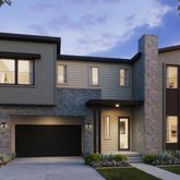 a front view of a house with yard